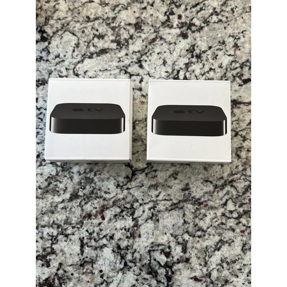 2 empty Apple TV boxes no Apple TV included